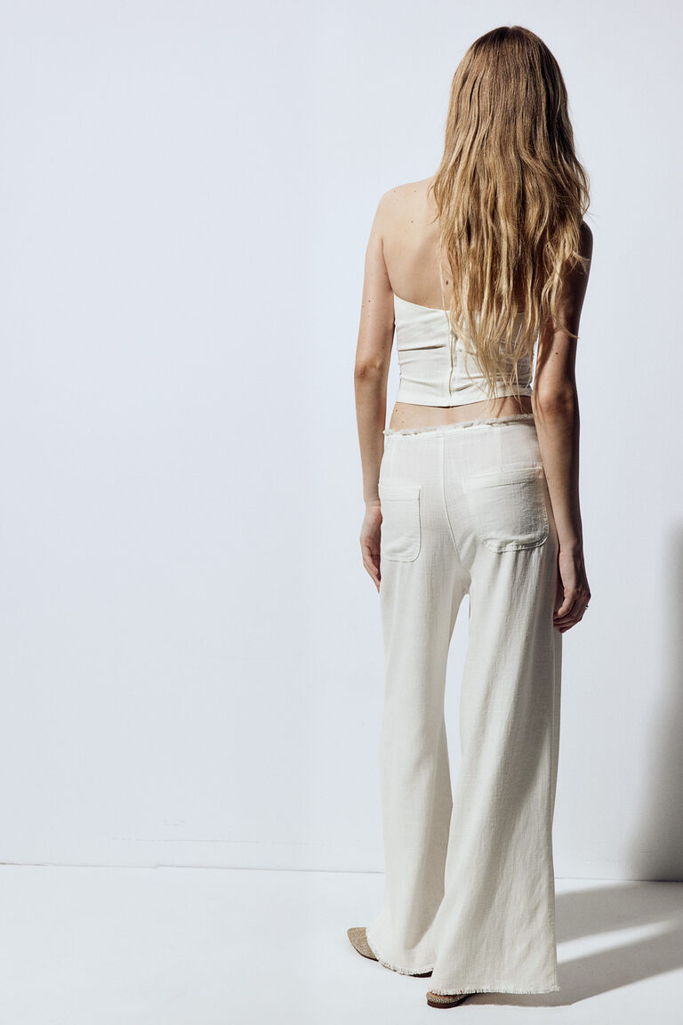 Valérinne Aéris Frayed Waist Wide-Leg Trousers